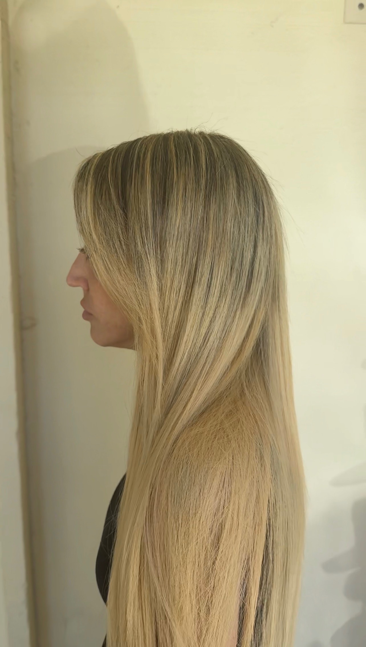 Side profile of blonde extension length